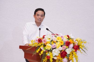 Ủy viên Bộ Chính trị, Bí thư Thành ủy TP. Hồ Chí Minh Trần Lưu Quang trình bày chương trình hành động tại hội nghị tiếp xúc giữa cử tri. Ảnh: Trung Tuyến - TTXVN