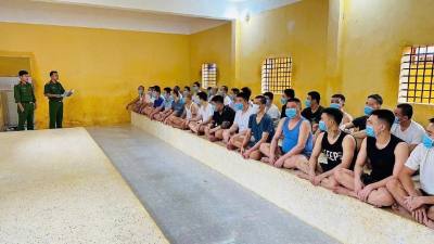 Tuyên truyền, hướng dẫn tại các khu giam, buồng giam để người bị tạm giữ, tạm giam nắm rõ các quy định Ảnh: TTXVN phát